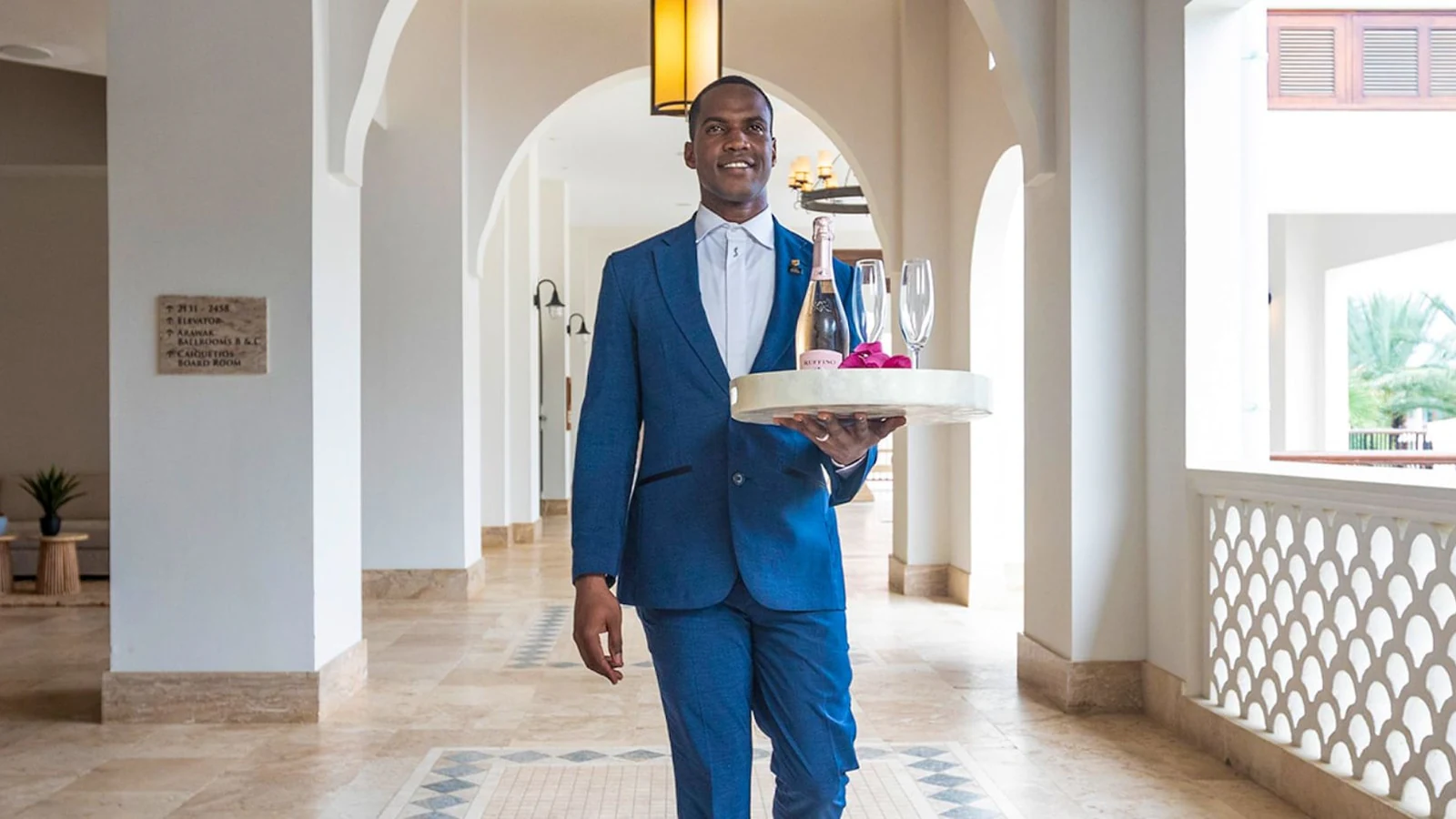 Luxury travel concierge assisting clients