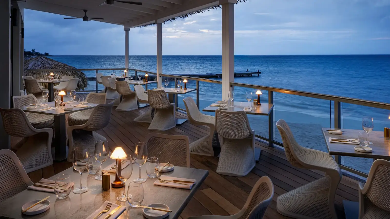 Intimate romantic dinner on a private beach at sunset